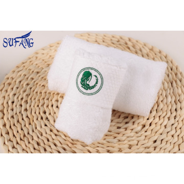 O costume barato personalizou toalhas de banho 100% de toalha de mão do algodão com logotipo
